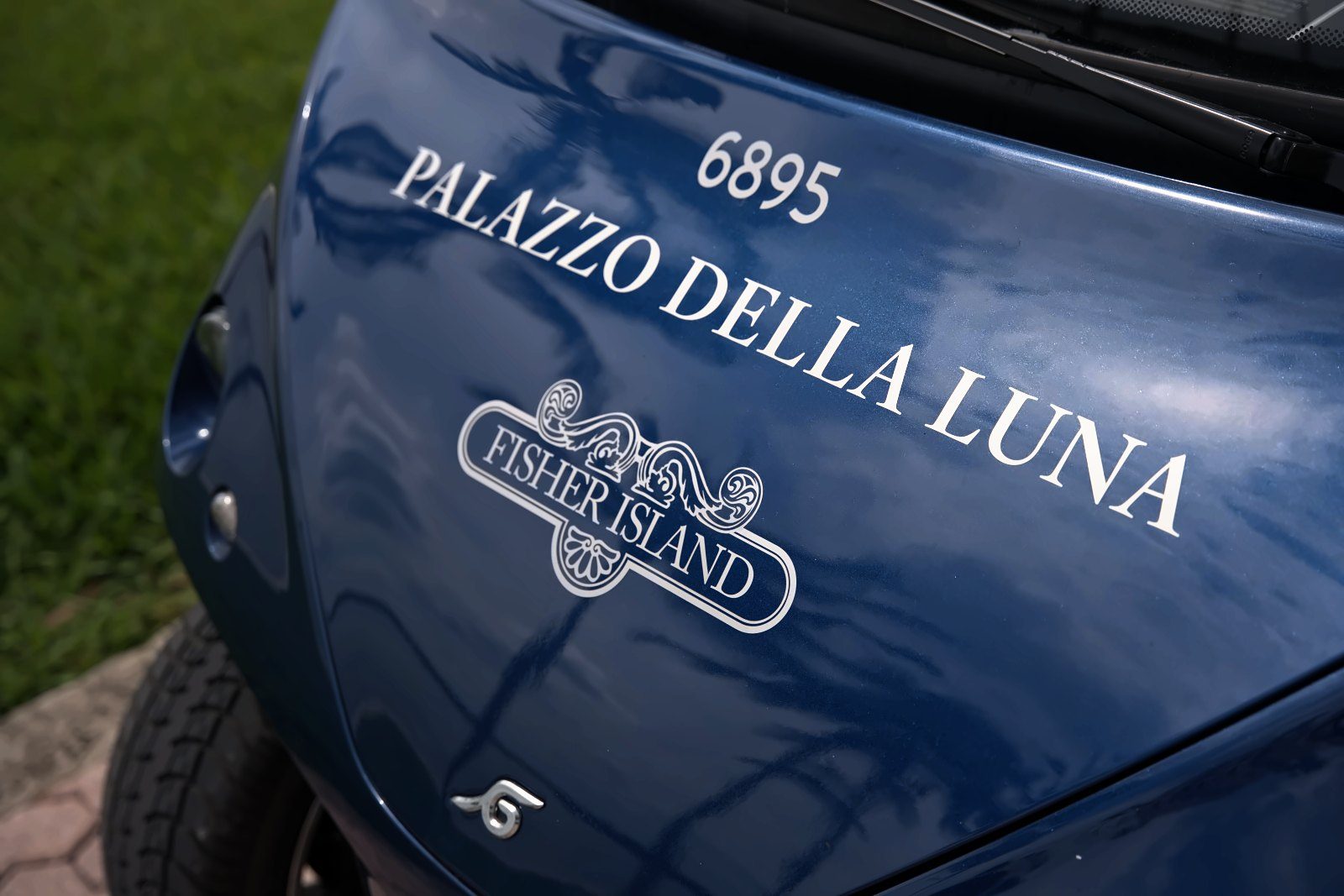 Palazzo della Luna crest on a Fisher Island resort cart