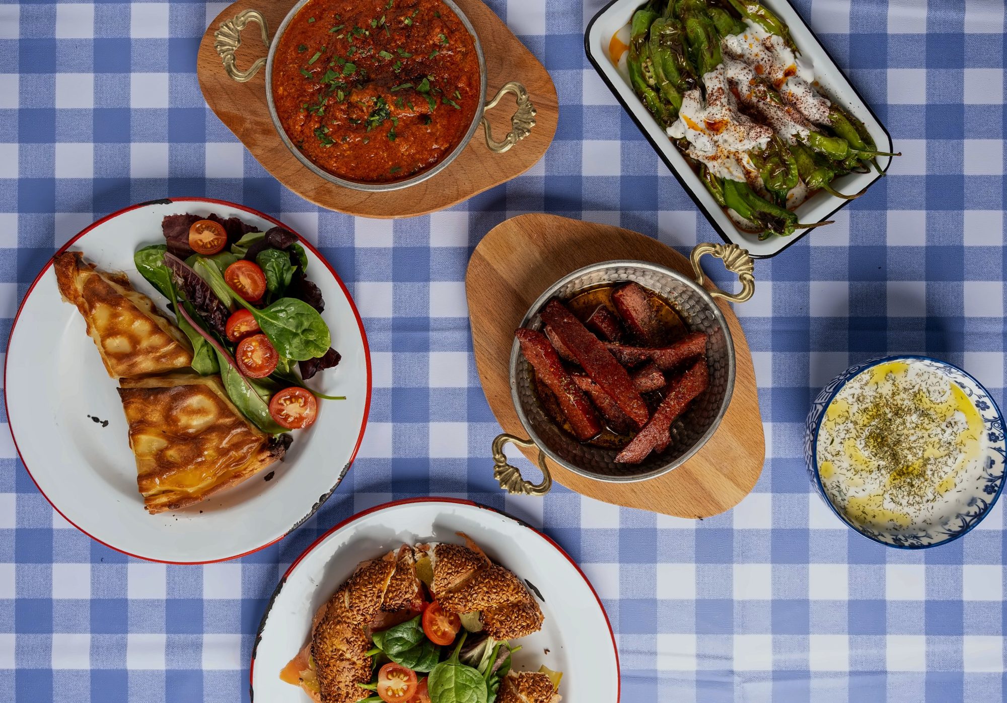El Turco dishes on a blue gingham tablecloth